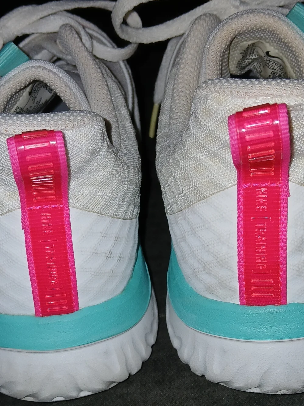 Nike Women’s White Athletic Sneakers with Pink Accents